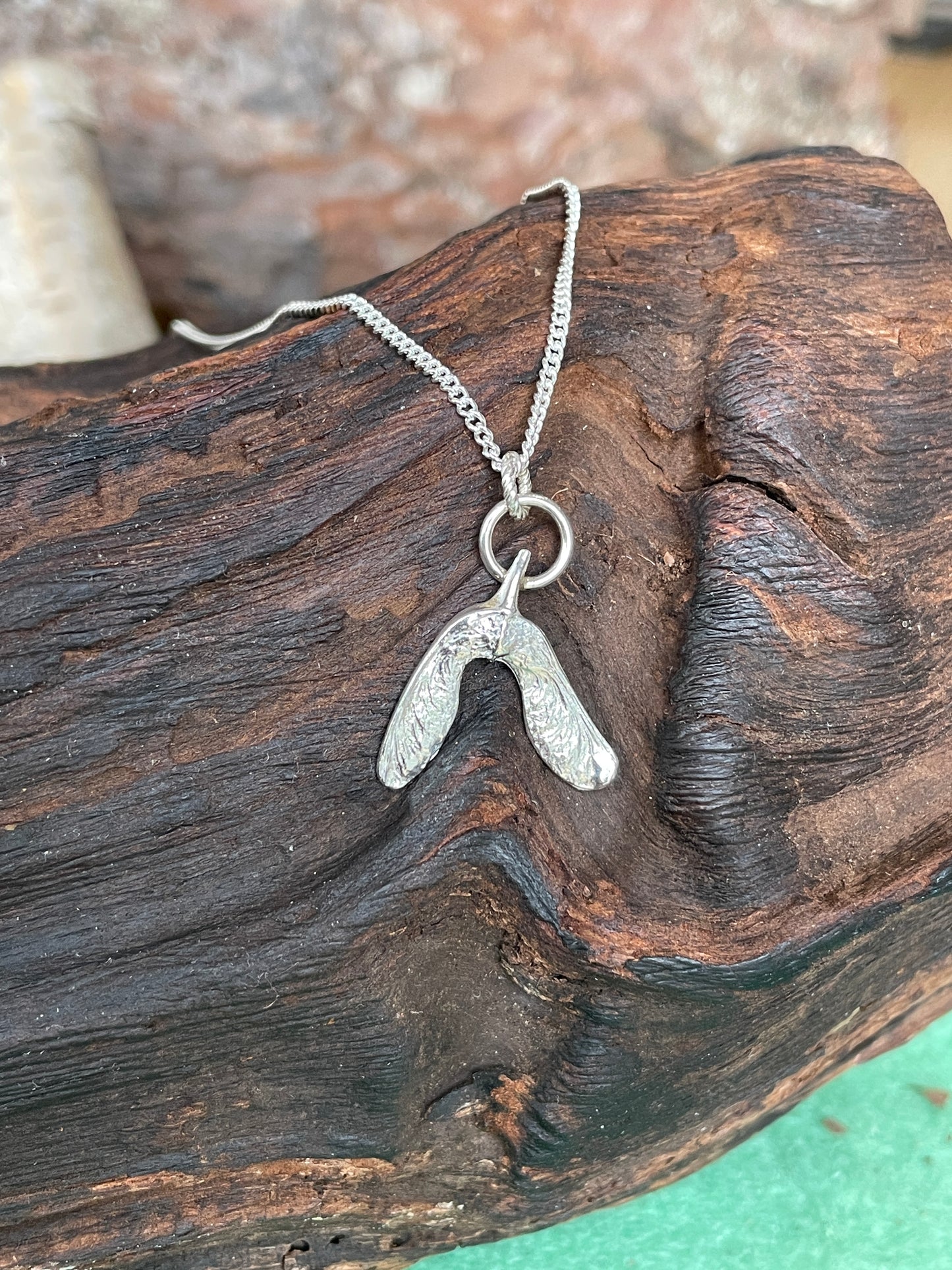 Dainty silver sycamore seed pendant
