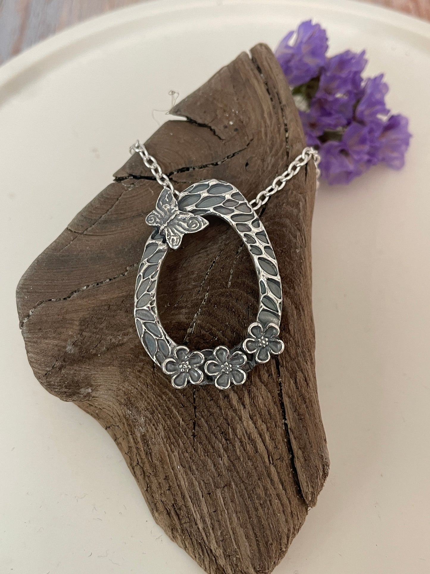 Silver Forget-me-not and butterfly pendant