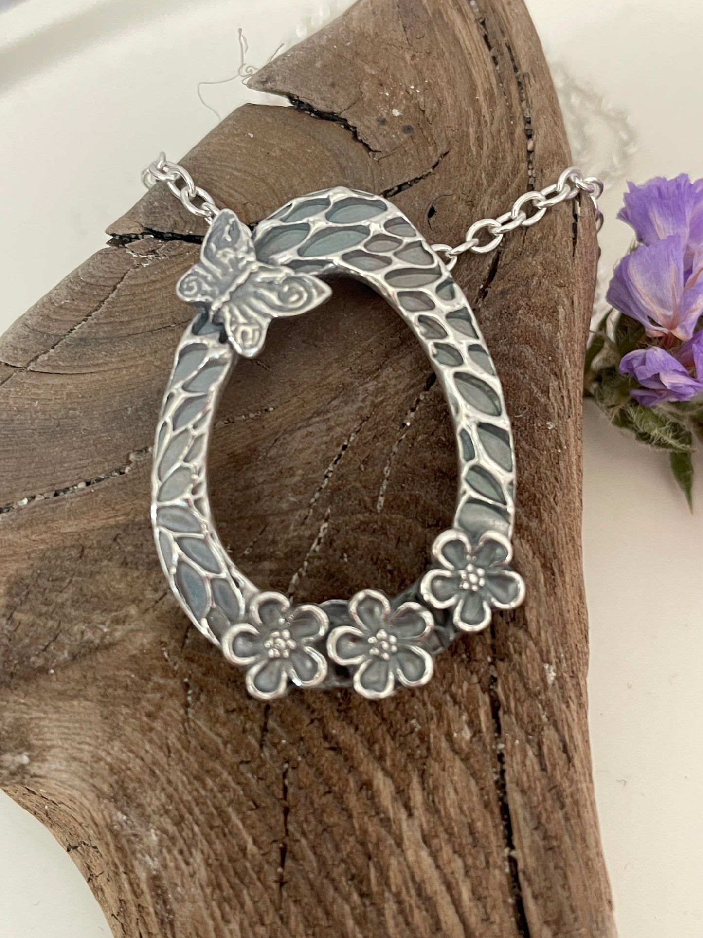 Silver Forget-me-not and butterfly pendant