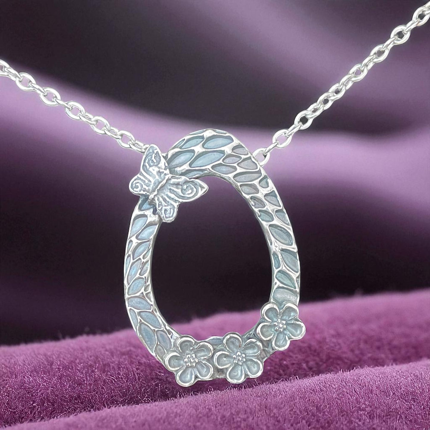 Silver Forget-me-not and butterfly pendant