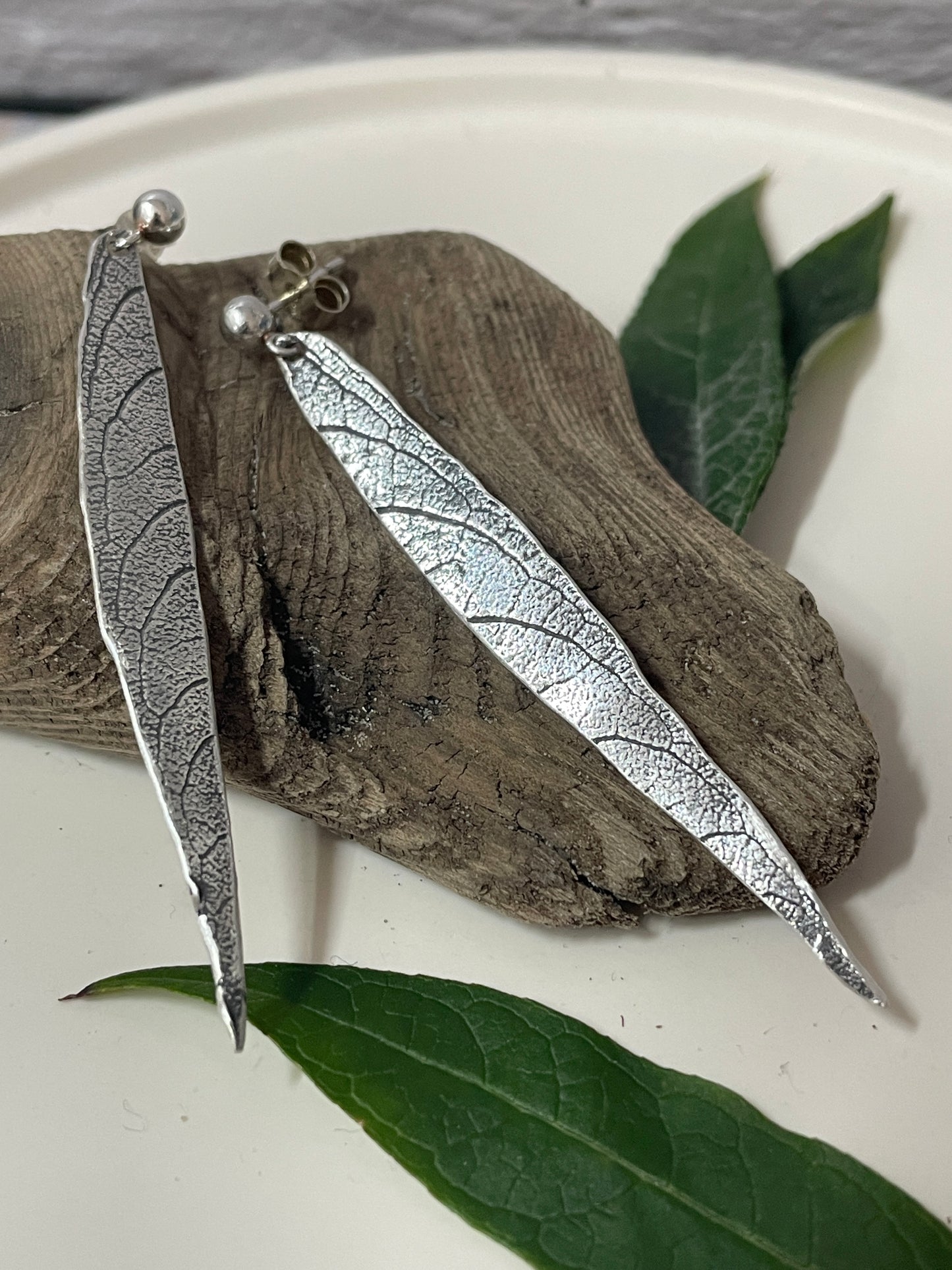 Long silver dangle leaf earrings