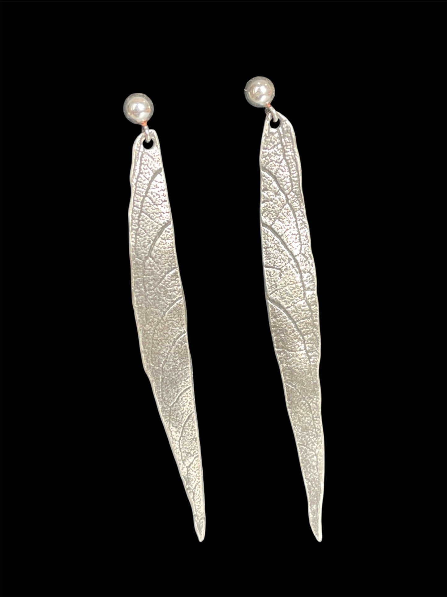 Long silver dangle leaf earrings