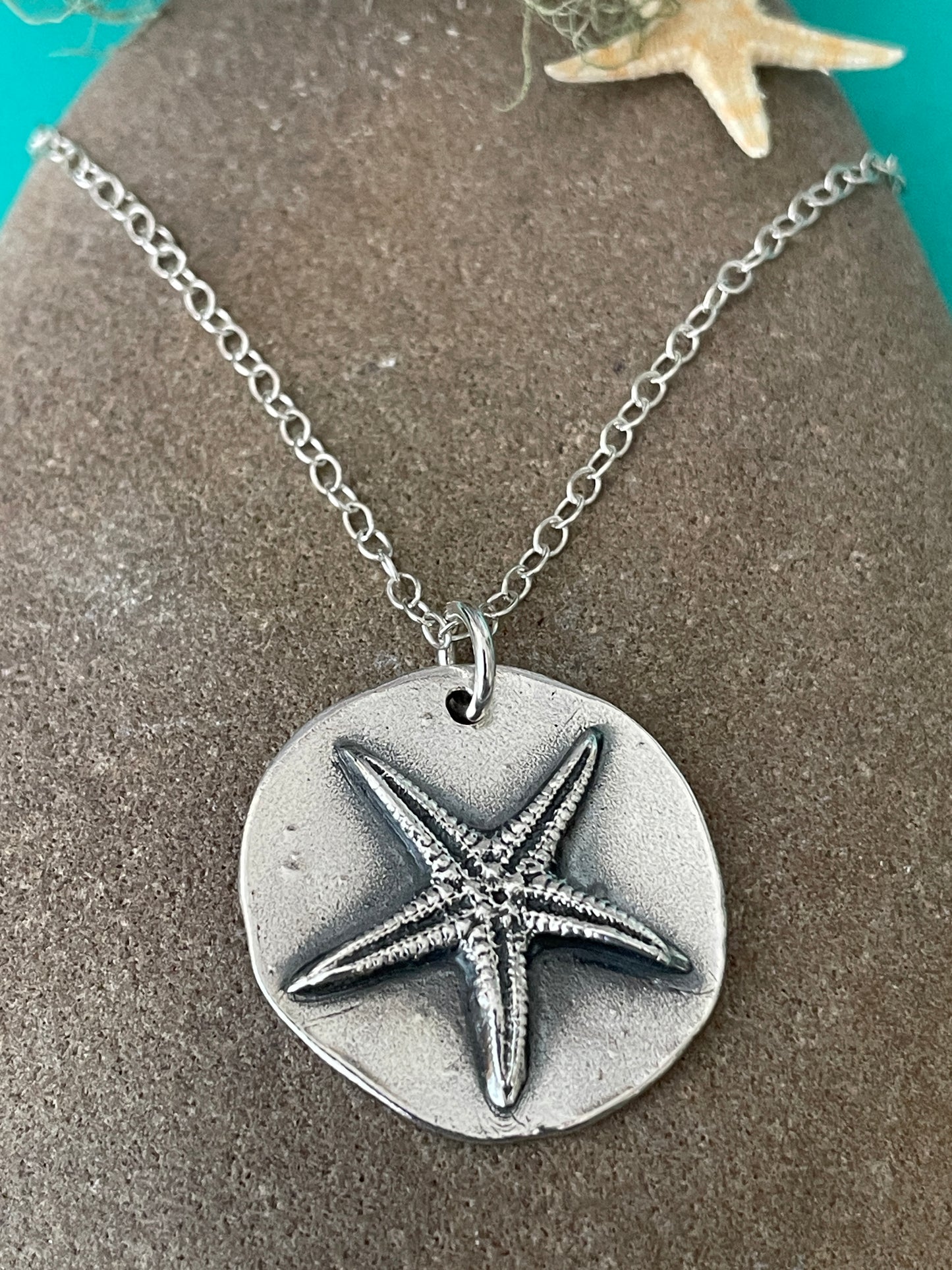 Starfish disc pendant
