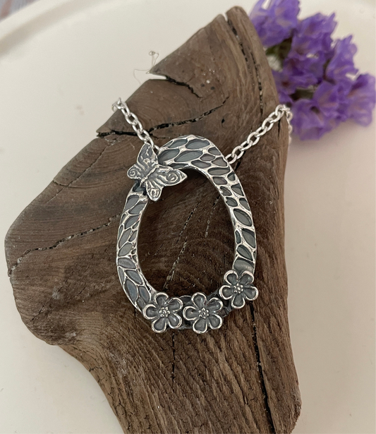 Silver Forget-me-not and butterfly pendant