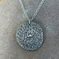 Reverse side of Molly and Me Jewellery Daisy disc pendant in fine silver