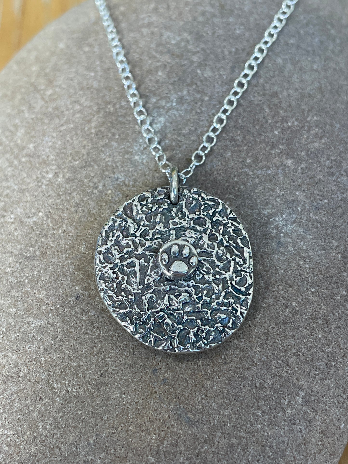 Reverse side of Molly and Me Jewellery Daisy disc pendant in fine silver