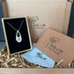 Silver Forget me not pendant with handpainted forget-me-not in a Molly and Me Jewellery branded gift box with cleaning cloth and instructions