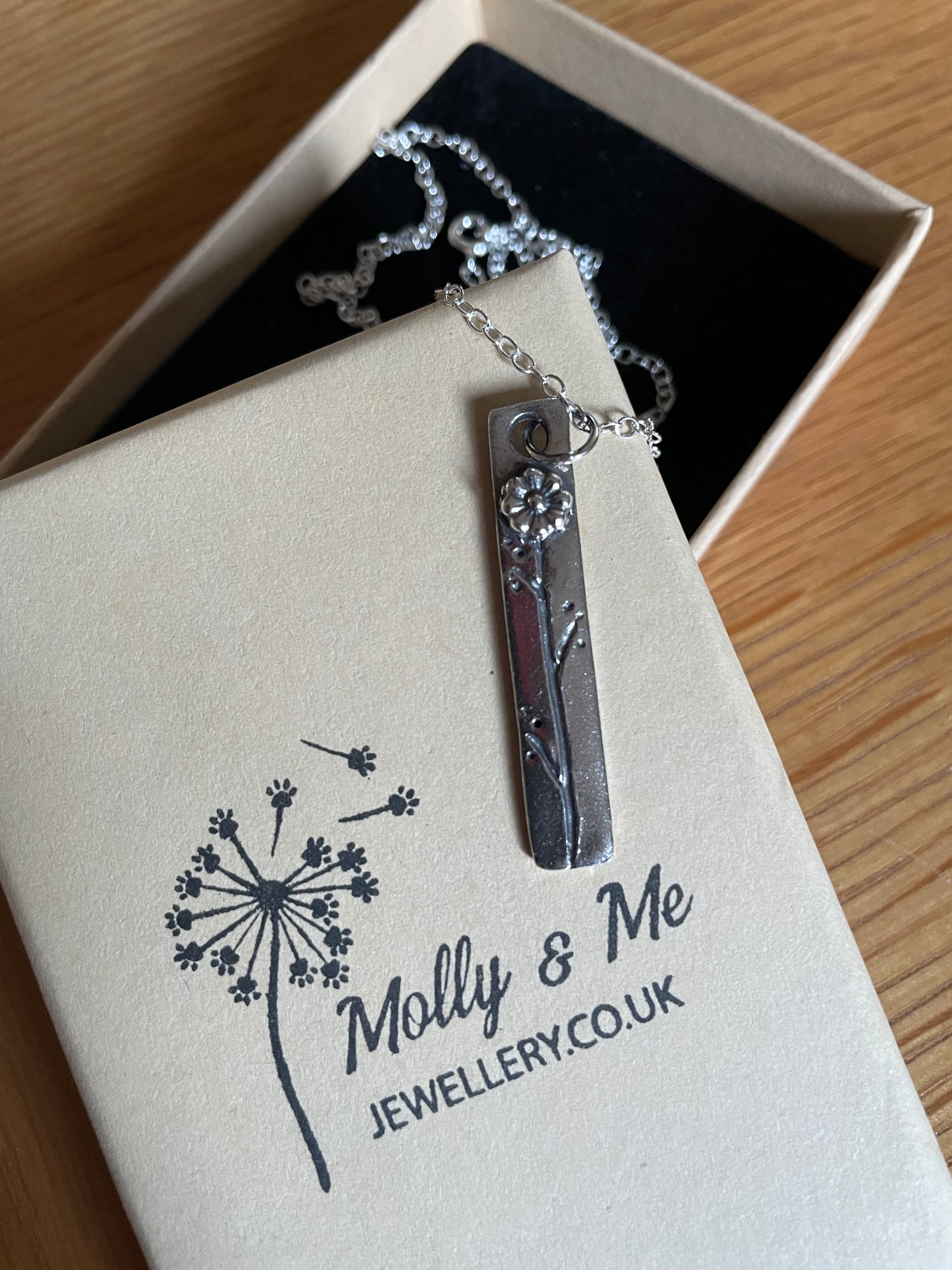 Thin rectangular sunflower pendant
