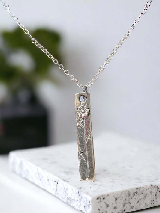 Thin rectangular sunflower pendant