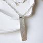 Thin rectangular sunflower pendant