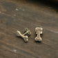 Dog bone stud earrings