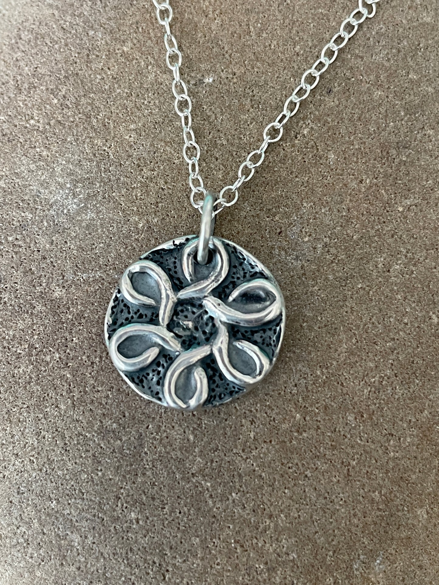 Stylised Flower Disc Pendant