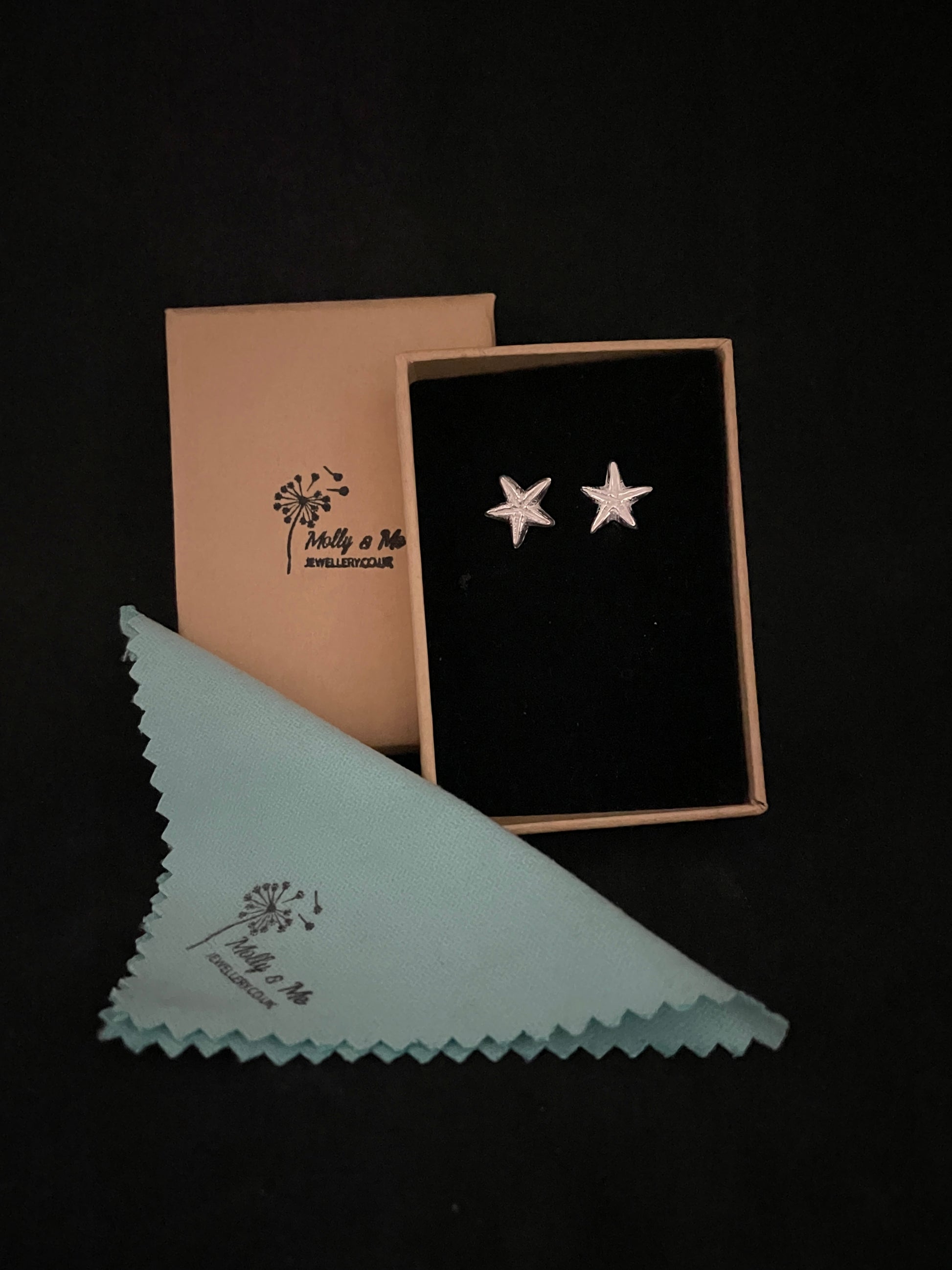 Small silver starfish stud earrings in branded Molly ad Me Jewellery gift packaging 
